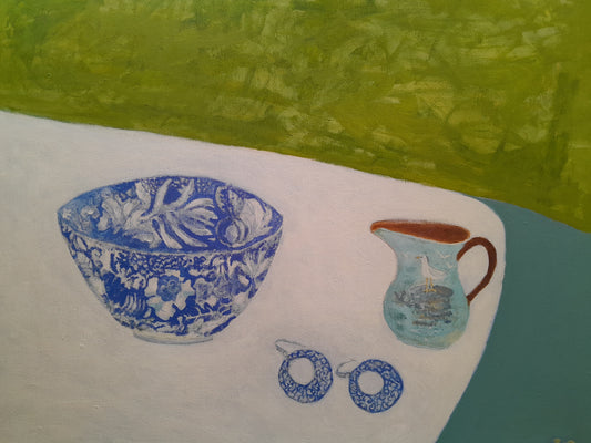 blue and white floral  & leaves, blue jug with seagull on rock, pair of blue hoop earrings with white, green and blue background