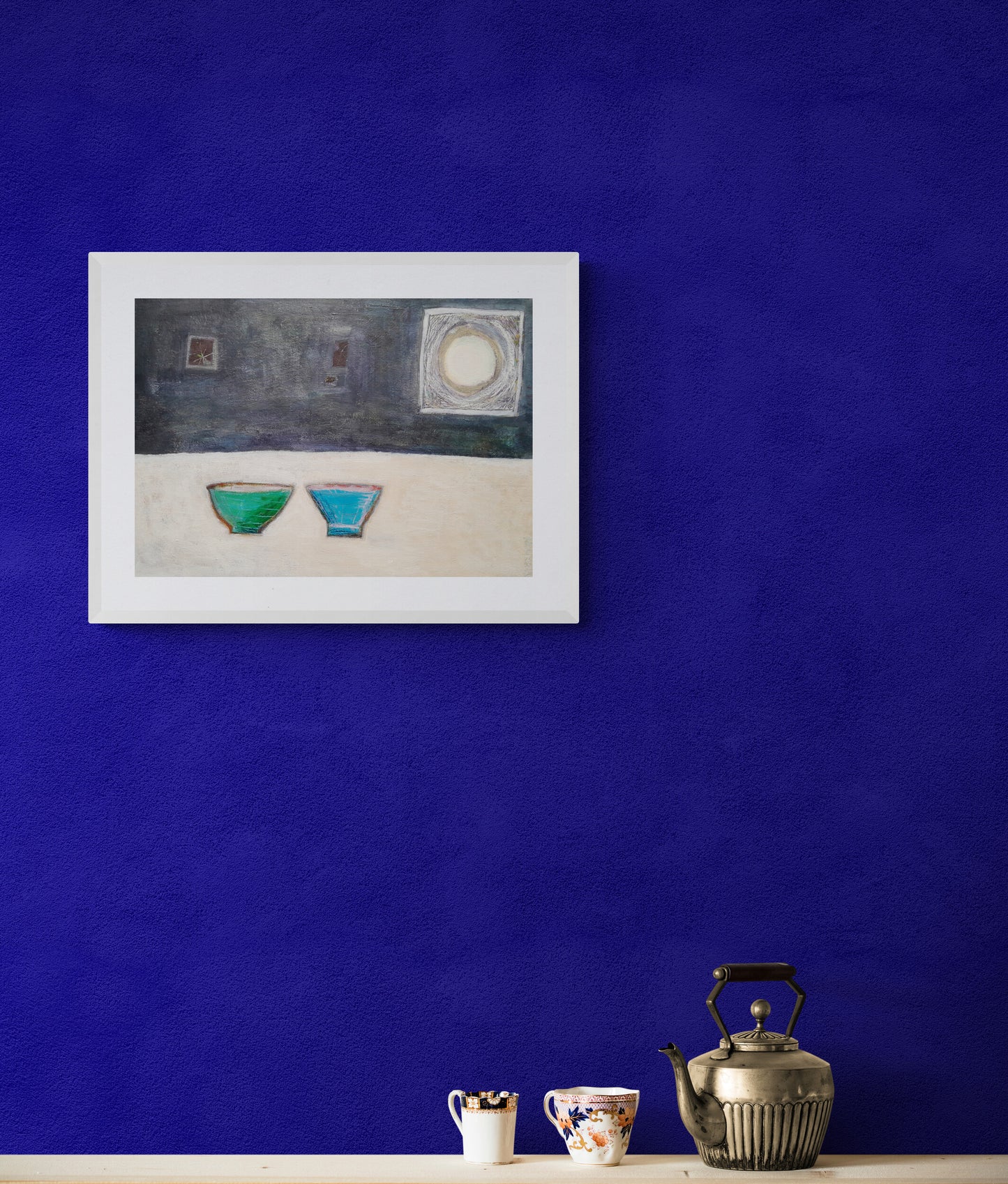 painting on a blue wall with old teapot, two cups